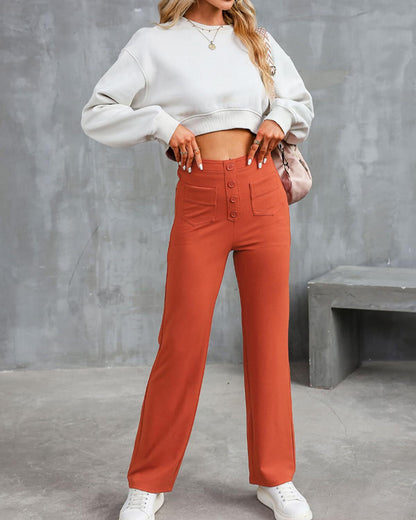 Damenhose mit hohem Bund, geradem Beinverlauf, Frontknopf und Seitentaschen